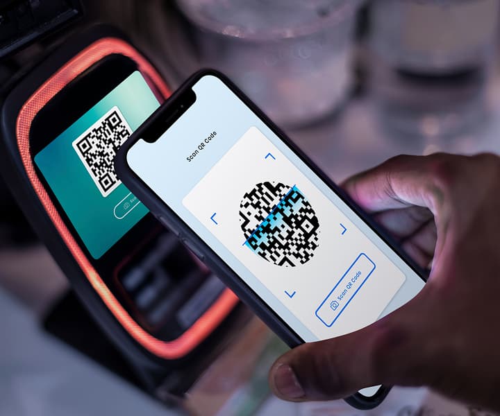 Two smartphones that read information with QR Code